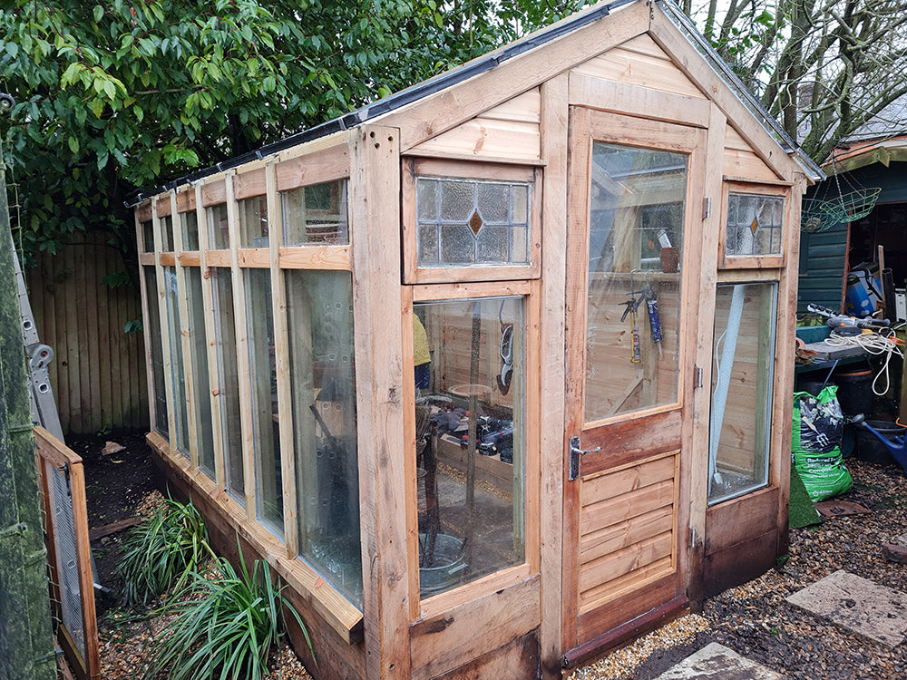 Greenhouse from salvaged double-glazed units